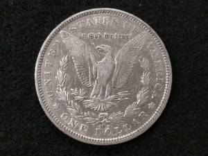 lot 25 image: 1891 O Morgan Silver Dollar...