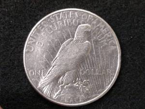 lot 82 image: 1928 S Peace Silver Dollar...