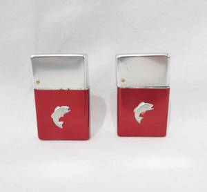lot 28 image: Lot of Vintage Early 1960s Brown and Bigelow Wind Master Lighters With Fish Theme