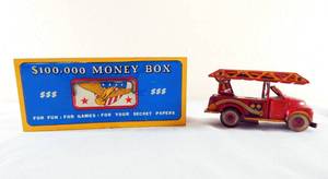 lot 53 image: Vintage 1950s Ohio Art Company $100,000 Money Box and Tin Friction Fire Truck