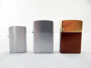 lot 60 image: Lot of Vintage 1960s Brown and Bigelow Wind Master and Windette Lighters