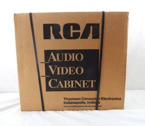 lot 16 image: New in Box RCA Audio Video Cabinet