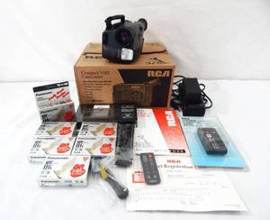 lot 10 image: RCA Small Wonder Compact VHS Video Camera and Accessories
