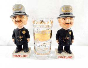 lot 169 image: Pair of Vintage Movieland Bobblehead Figures and Glass