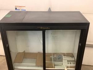 lot 27 image: Unused True Industrial Glass-Front Refrigerator