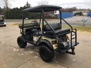lot 5 image: 2010 BAD BOY BUGGIE - SWEET RIDE-- 4X4 - NEW BATTERIES - WINCH - LIGHTS - RACKS - SO MANY EXTRAS - THIS IS AN AMAZING CART