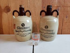 lot 23 image: Glenmore Bourbon Whiskey Jugs with Shot Glass