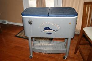 lot 5 image: Tommy Bahama The Entertainer 77Qt Rolling Portable Patio Party Cooler