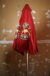 lot 140 image: Kona Brewing Patio Umbrella