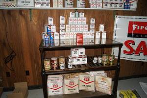 lot 31 image: Vintage Counter, Oil and Air Filters And Unopened Cans of Oil