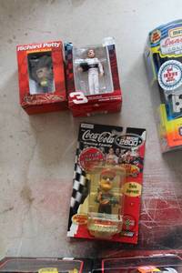 lot 110 image: Lot of (3) NASCAR Richard Petty, Dale Earnhardt, Dale Jarrett Action Figures