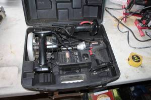 lot 29 image: Craftsman 18VDC Cordless 5-12in. Trim Saw, 19.2VDC Impact Driver 315.114832, 18VDC Worklight, Charger, Case