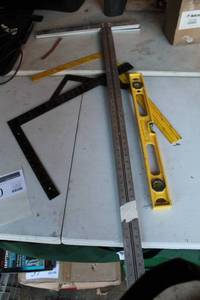 lot 50 image: Lot of (7) Drywall T-Squares, Level, Angle Rulers