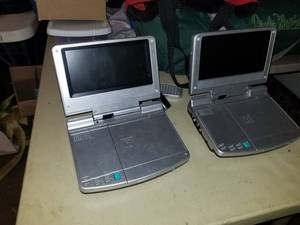 lot 133 image: Lot of (2) 2007 Go Anywhere 7in. Portable DVD Players