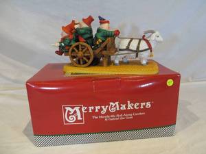 lot 34 image: Merry Makers The Merry-We-Roll-Along Carolers & Gabriel the Good by Dept. 56 wBox