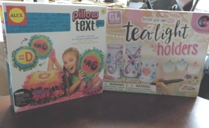 lot 89 image: Pillow Text and Tea Light Holders K...