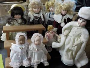 lot 130 image: 16 Dolls, Steps and Stands...