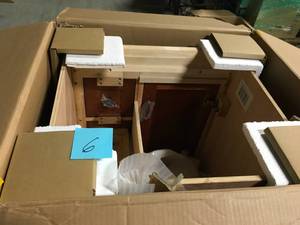 lot 6 image: Home Decorators Collection Naples 24 in. W x 21.63 in. D Bath Vanity Cabinet Only in Warm Cinnamon- not used