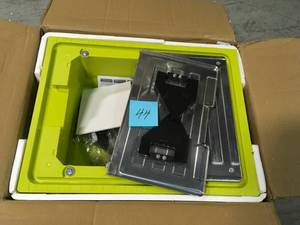 lot 44 image: RYOBI 7 in. 4.8 Amp Tabletop Tile Saw- open box