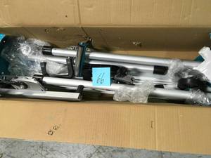 lot 66 image: Compact Folding Miter Saw Stand- open box