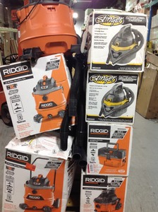 lot 311 image: Pallet of assorted Ridgid Vacuums different sizes some may need repair or have missing pieces
