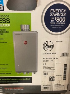 lot 205 image: Rhem Performance Plus 8.4 GPM Natural Gas Mid Efficiency Indoor Tankless Water Heater not used seal box REtails for $900