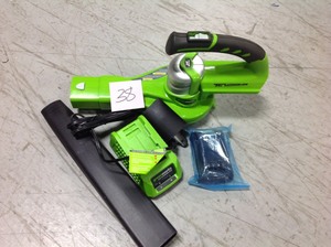 lot 38 image: Greenworks G-24 130 MPH 135 CFM 24-Volt Cordless Handheld Leaf Blower - Battery and Charger Included- not used