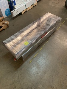 lot 9 image: Weather Guard 71.38 in. Diamond Plate Aluminum Full Size Crossbed Locking Truck Tool Box- has keys. but wont open because of dent on corner