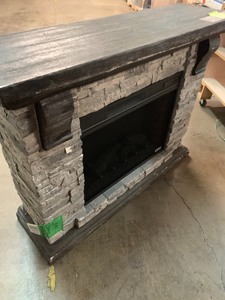 lot 14 image: Highland 50 in. Faux Stone Mantel Electric Fireplace in Gray- Scratched dings- used
