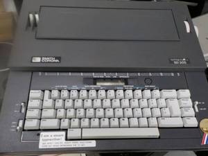 lot 77 image: Smith Corona Typewriter...
