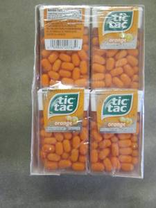 12 packs Orange TicTacs...
