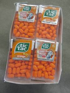 12 packs Orange TicTacs...
