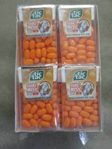12 packs Orange TicTacs...
