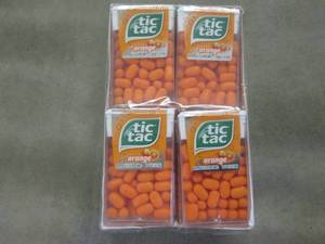 12 packs Orange TicTacs...