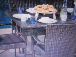 Brown Wicker Dining Table...
