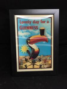 lot 64 image: Lovely Day for a Guiness 3D Illusion, framed lenticular print.