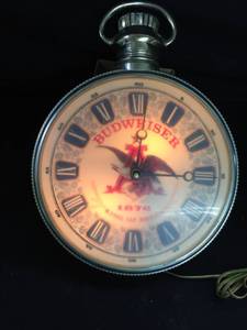 lot 79 image: Bud pocket watch light up wall clock