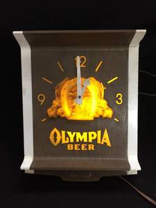 lot 83 image: Olympia Beer light up clock from Mayslacks Bar