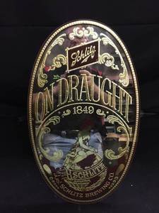 lot 98 image: Schlitz on Draught oval mirror