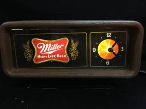 lot 129 image: Miller High Life cash register light up  clock