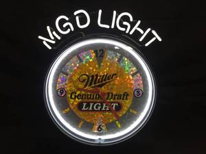 lot 174 image: Miller Genuine Draft  MGD Light clock with neon