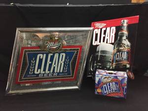 lot 187 image: Miller Clear 3 item lot Mirror, tin tacker, and 12-pack