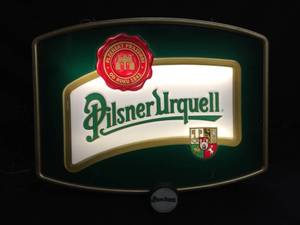 lot 204 image: Pilsner Urquell double-sided LED sign and hockey puck