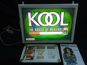 lot 206 image: Tobacco  Cigarette advertising Kool light up sign and window cling, and Virginia Slims tin