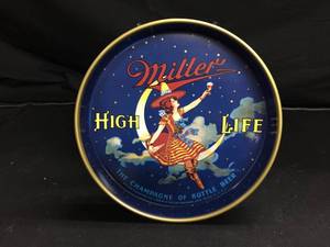 lot 212 image: Miller High Life Girl on the moon serving tray
