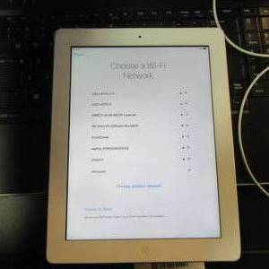 lot 25 image: Apple I-Pad Tested Unlocked Ready to use 64GB  cracked screen upper left corner