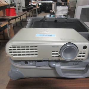 lot 63 image: TOSHIBA PROJECTION TV wlocking carrying case, remote,  accessories