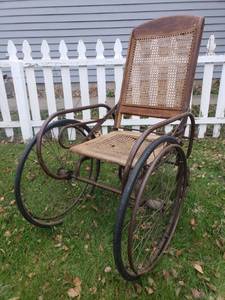 lot 100 image: Antique Bentwood and Rattan  Wicker Wheelchair