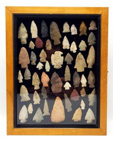 lot 88 image: Large Group of Native American Arrowhead  Stone Point  Eagle Effigy in Wooden Display Case