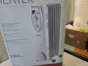 lot 3 image: Cuori Oil-Filled Radiator Heater Op...
